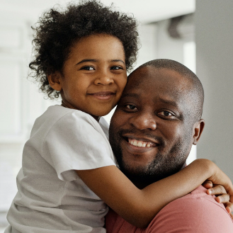 four year old hugging father
